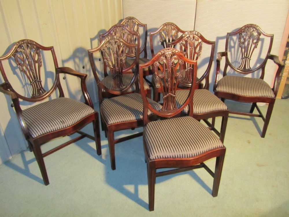 A set of 8 Victorian Mahogany Shield Back Dining Chairs
