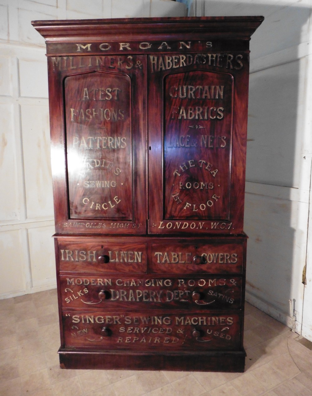  A Victorian Flame Mahogany Linen Press from a Haberdashery or Drapers Shop Display