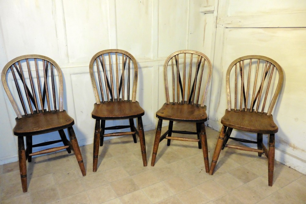 A Set of 4 High Wycombe Beech & Elm Hoop Back Windsor Chairs