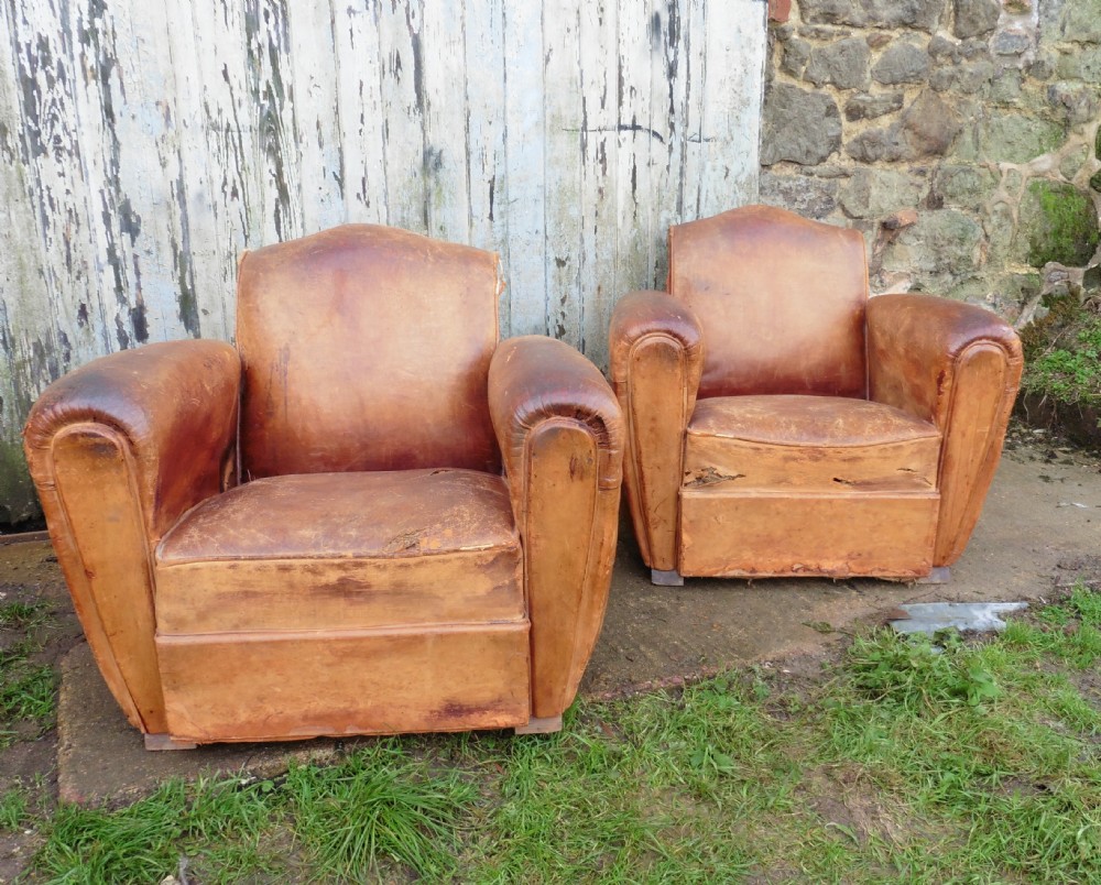 A Pair of French Art Deco Shabby Leather Club Chairs