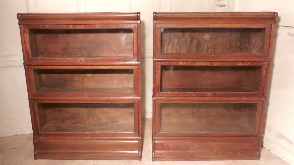 A Pair of 3 Stack Oak Globe Wernicke Barristers Bookcases