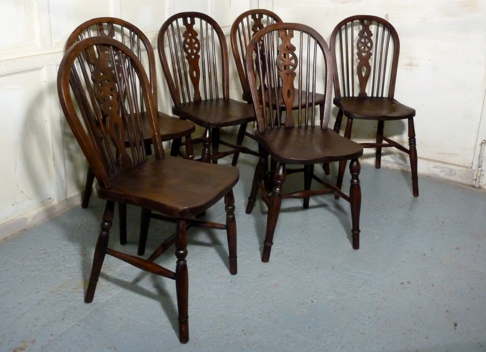 A Harlequin Set of 6 Victorian Beech & Elm Wheel Back Windsor Kitchen Dining Chairs
