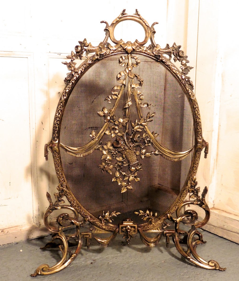A Superb French Brass Rococo Fire Guard, Spark screen
