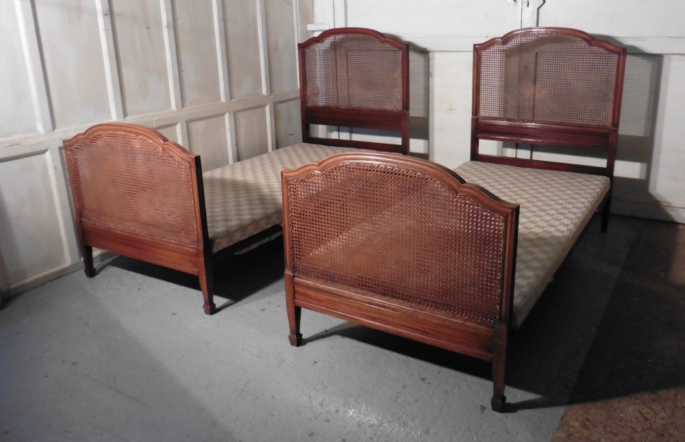 A Superb Pair of Art Deco Mahogany, Bergère  Twin Beds, by Maples