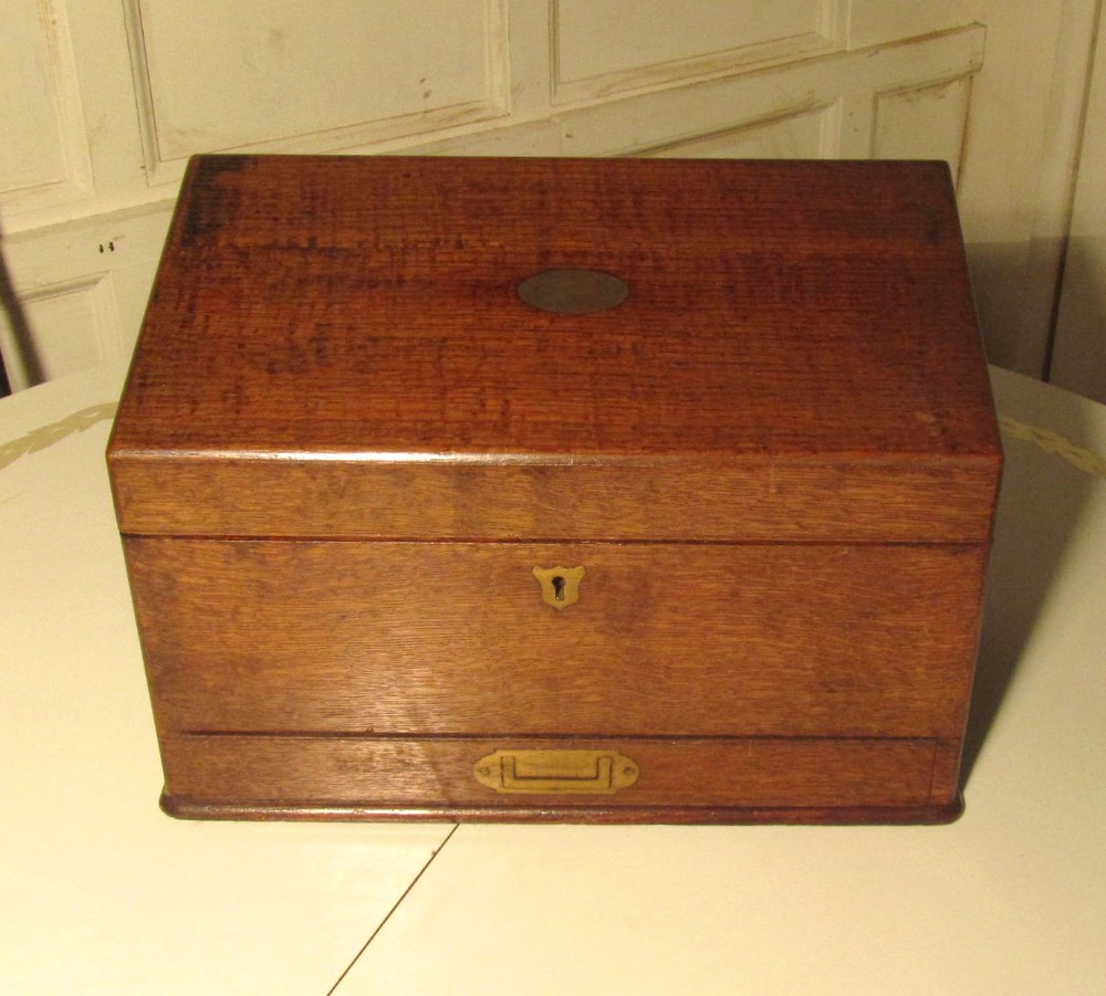 A Charming Arts and Crafts Golden Oak Stationary Box 