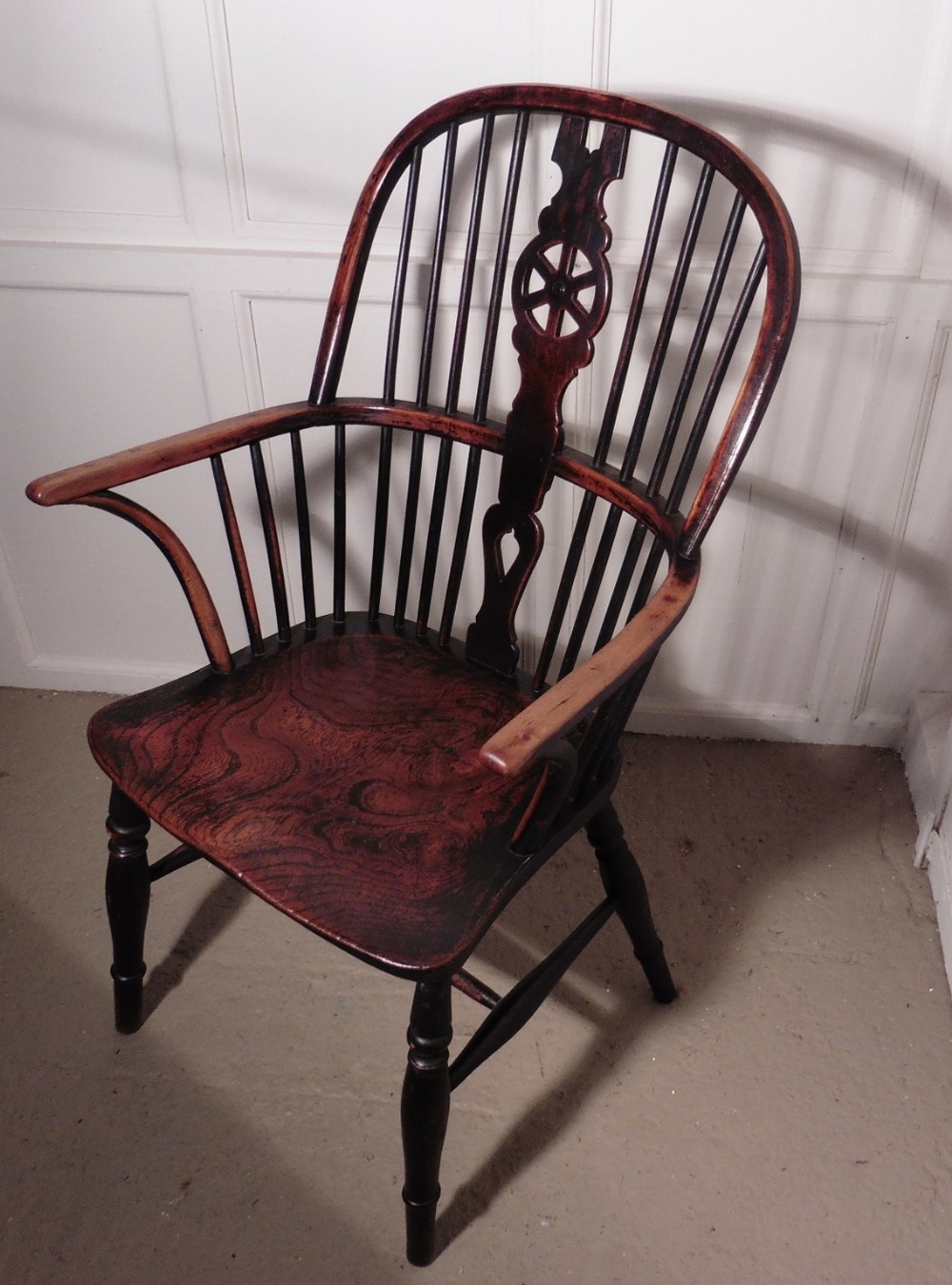 A Georgian Elm and Yew Wheel Back Windsor Carver Chair