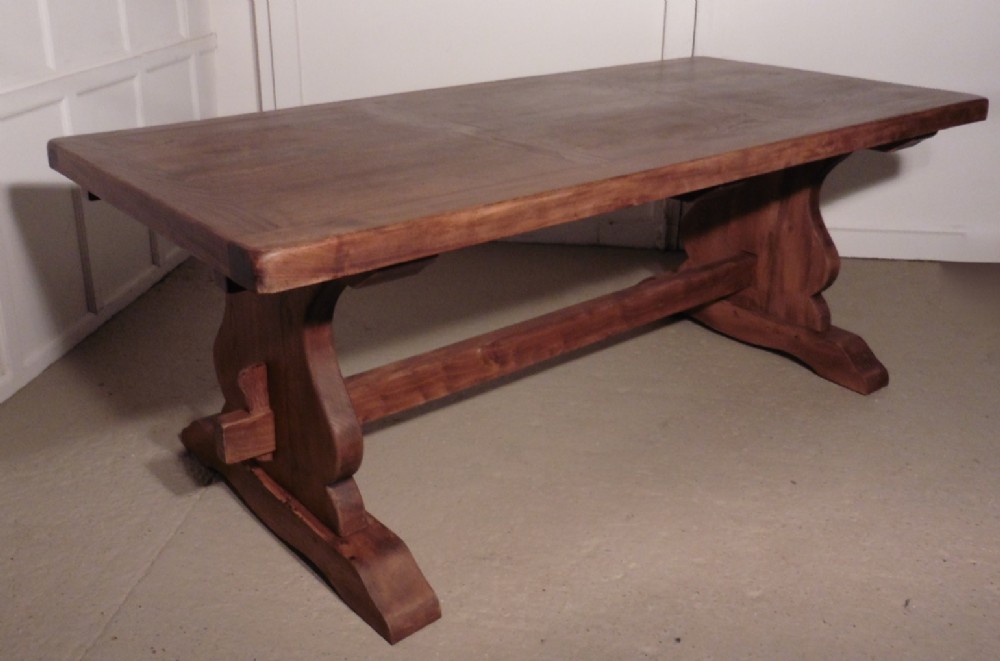 A Large French Elm Refectory Extending Table