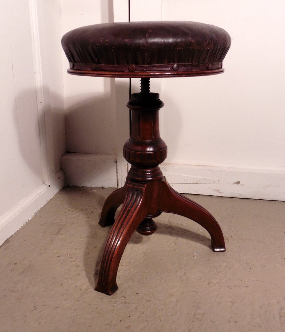 An Elegant Victorian Mahogany Swivel Piano Stool by Howe