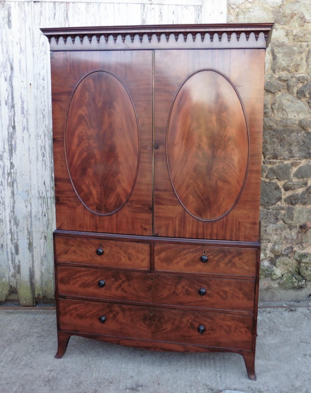 A Georgian Flame Mahogany Linen Press