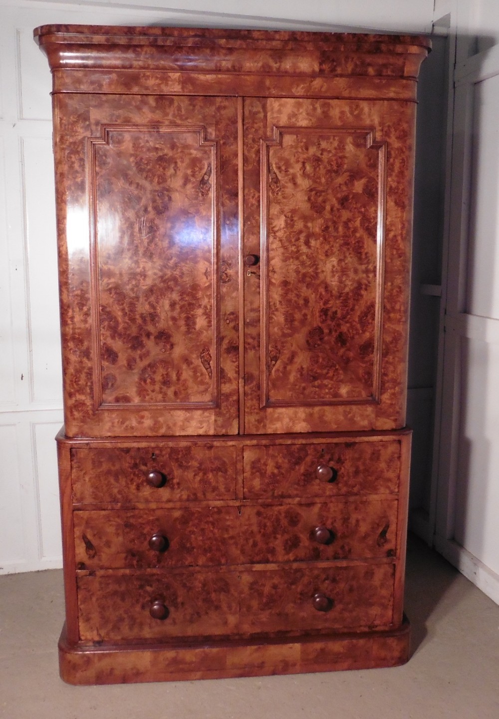 An Outstanding Victorian Burr Walnut Linen Press