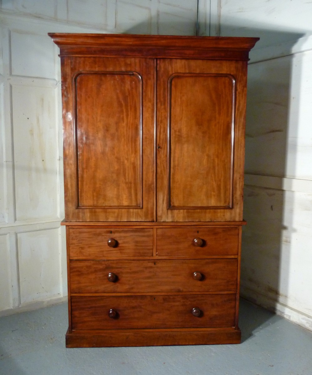 A Victorian Flame Mahogany Linen Press 