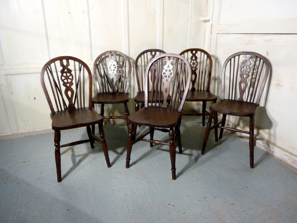 A Harlequin Set of 6 Victorian Beech & Elm Wheel Back Windsor Kitchen Dining Chairs
