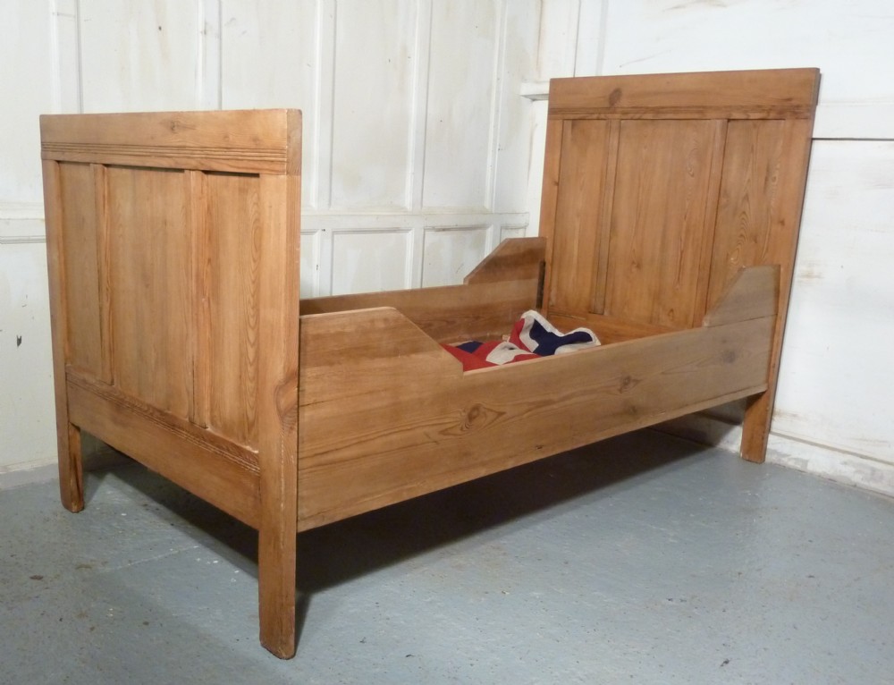 A 19th Century French Rustic Pine Single Sleigh Bed
