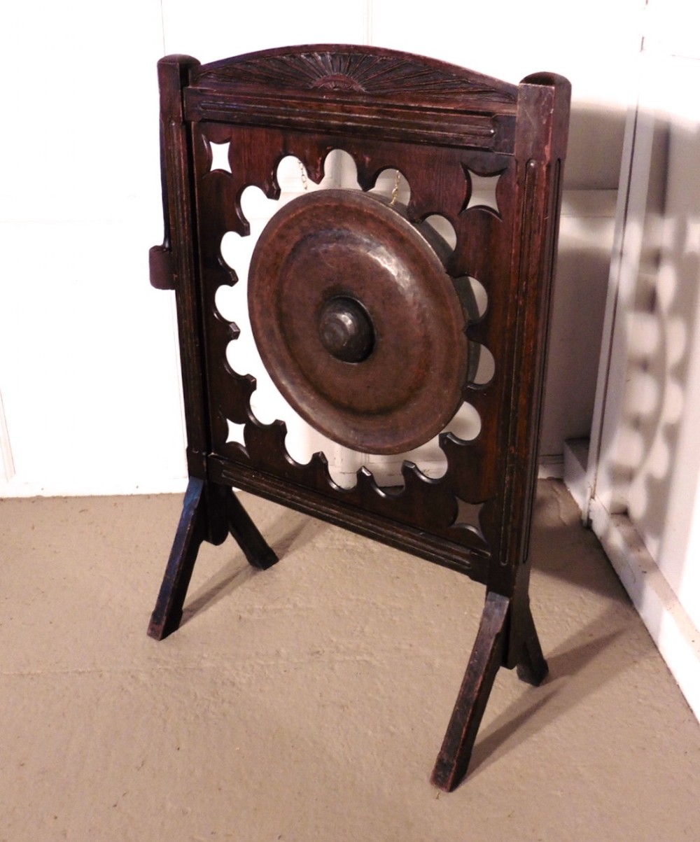 A Large Art Deco Mahogany and Brass Dinner Gong