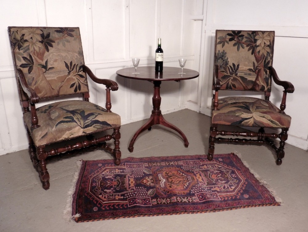 A pair of French Arts and Crafts Walnut Library Chairs 