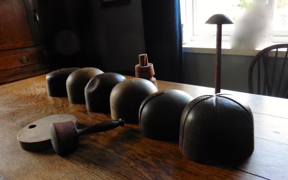 A Collection of Vintage 19th Century French Hat Blocks, shop display
