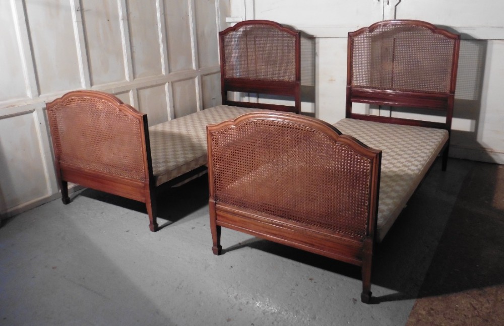 A Superb Pair of Art Deco Mahogany, Bergère  Twin Beds, by Maples
