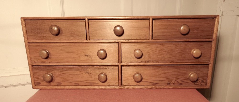A  Small Victorian Pine Collectors Cabinet or Filing Drawers