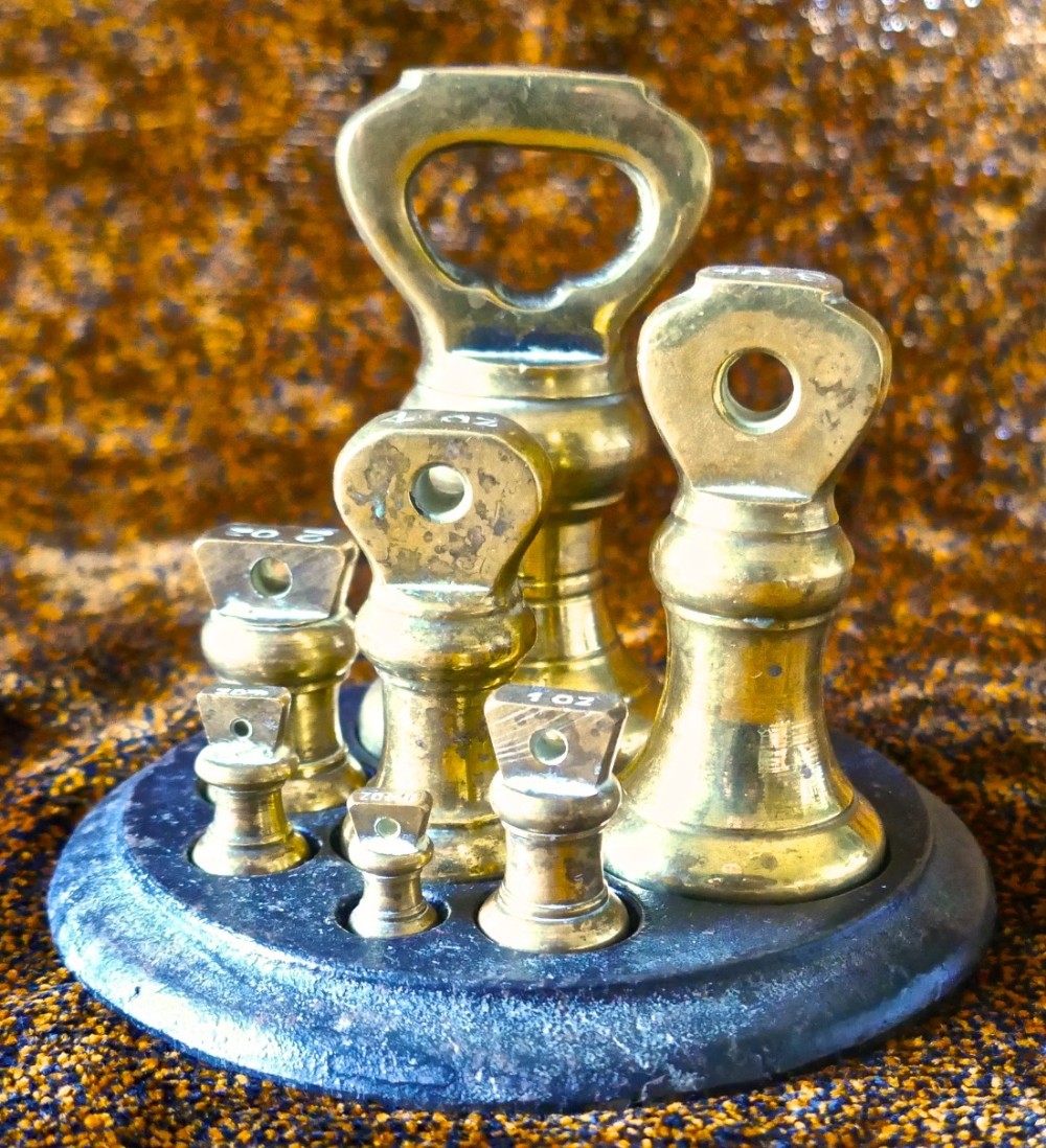Set of Seven Kitchen Brass Bell Weights on Stand
