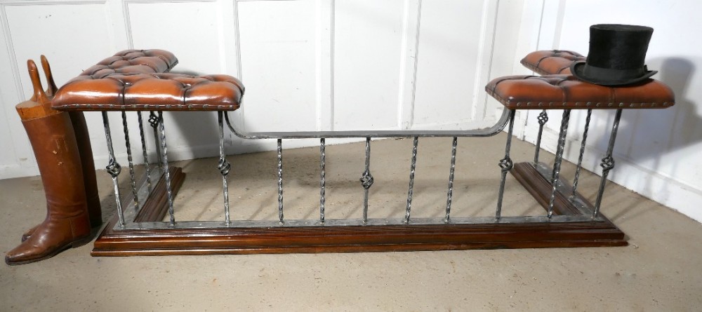 A Large Polished Steel and Leather Club Fender
