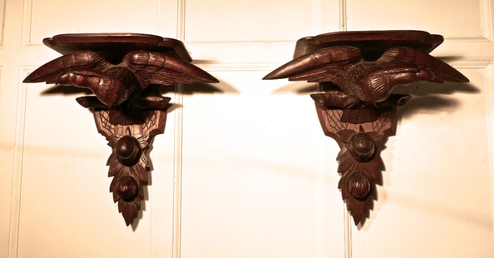 A 19th Century Pair of Carved Oak Wall Brackets, Eagles