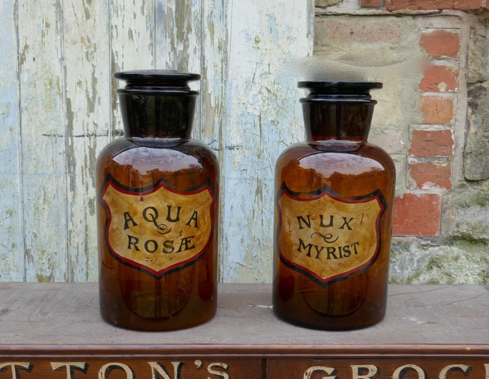 A Pair of Amber Glass Chemist Jars, Large Stoppers
