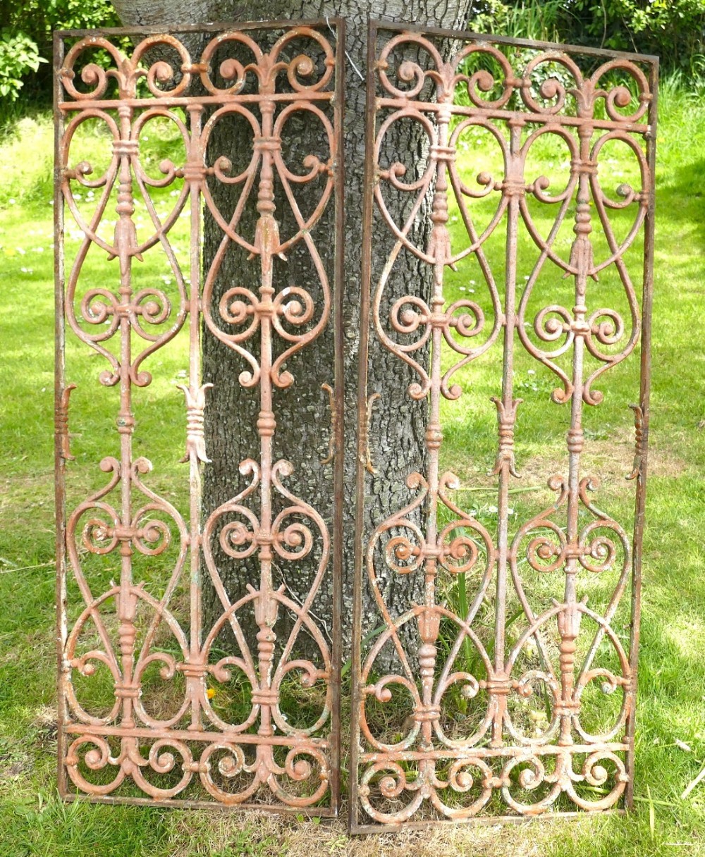 A Pair of Large French Cast Iron Arts and Crafts Door Panels
