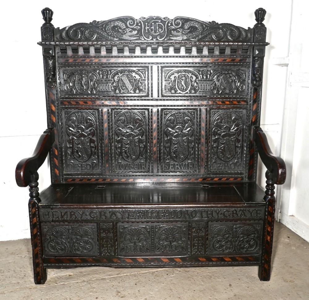 An 17th Century High Back Inlaid Oak Marriage Settle