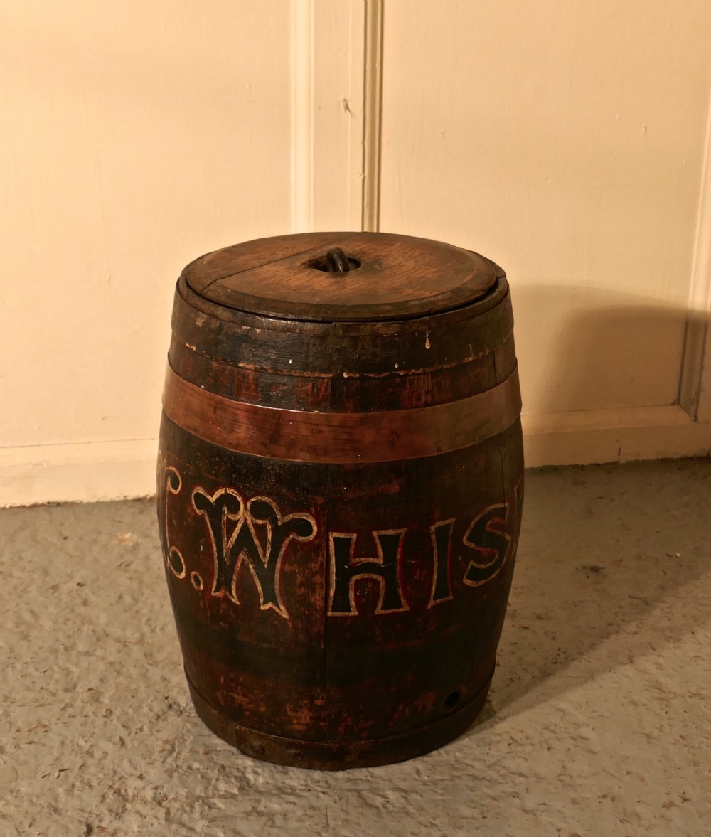 A 19th Century Oak and Copper Irish Whiskey Barrel