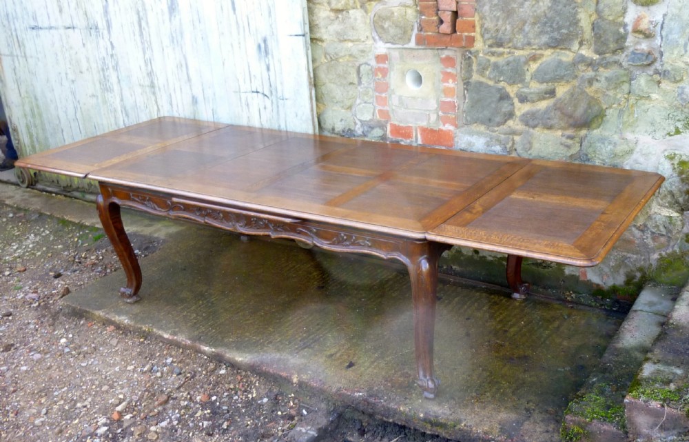 A Large French Oak Draw Leaf Table  View IV