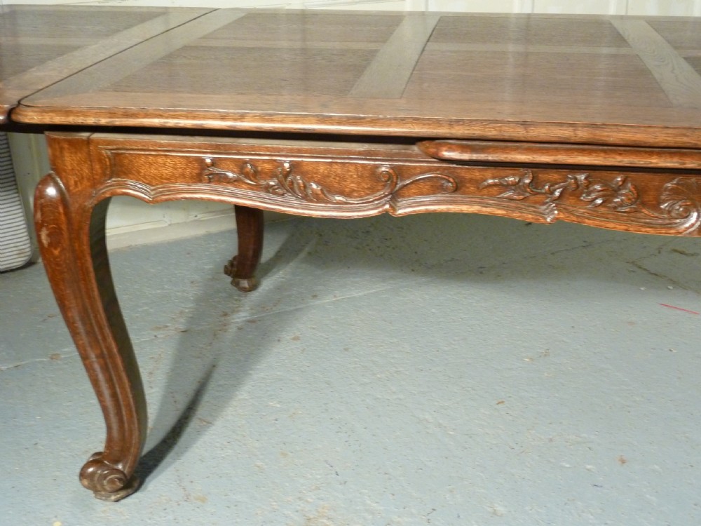 A Large French Oak Draw Leaf Table  View VI