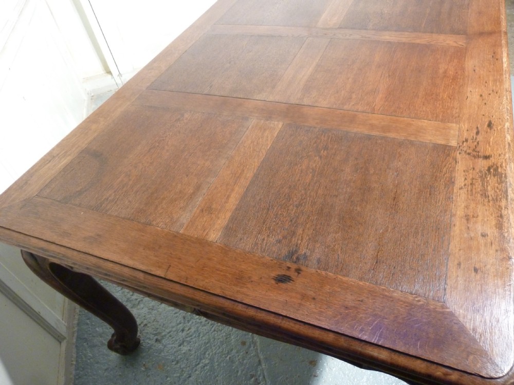 A Large French Oak Draw Leaf Table  View VII