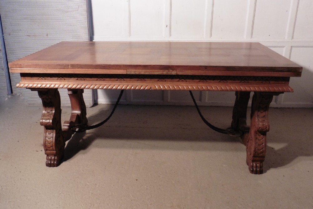 A Very Large 19th Century Carved and Parquetry Oak Draw Leaf table81