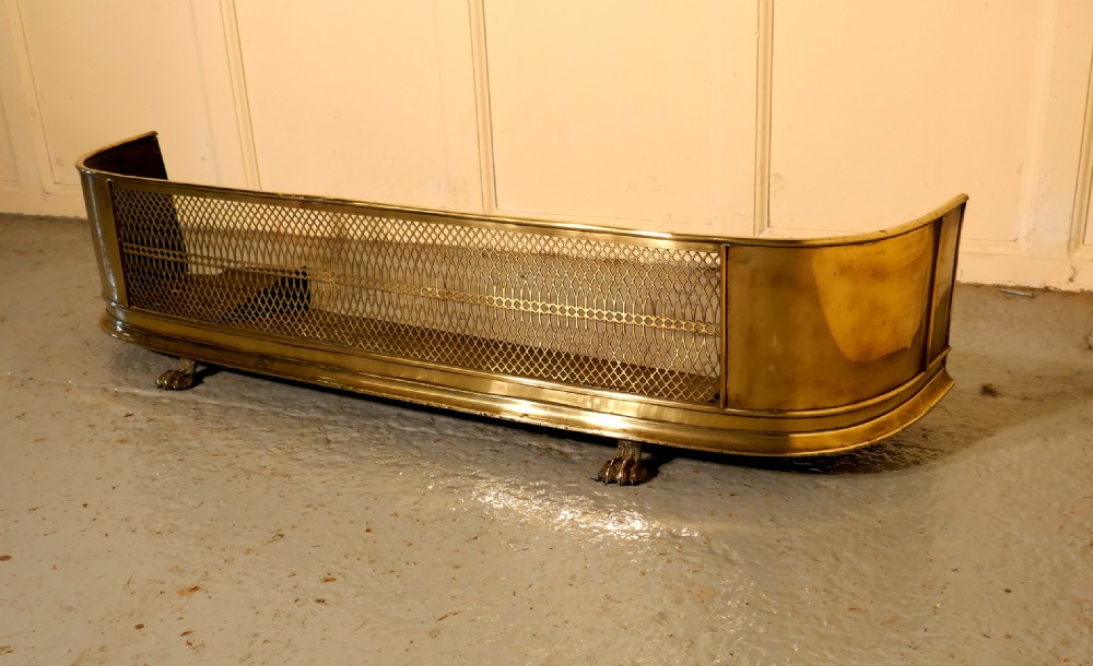 A Exceptional Georgian Pierced Brass Fender