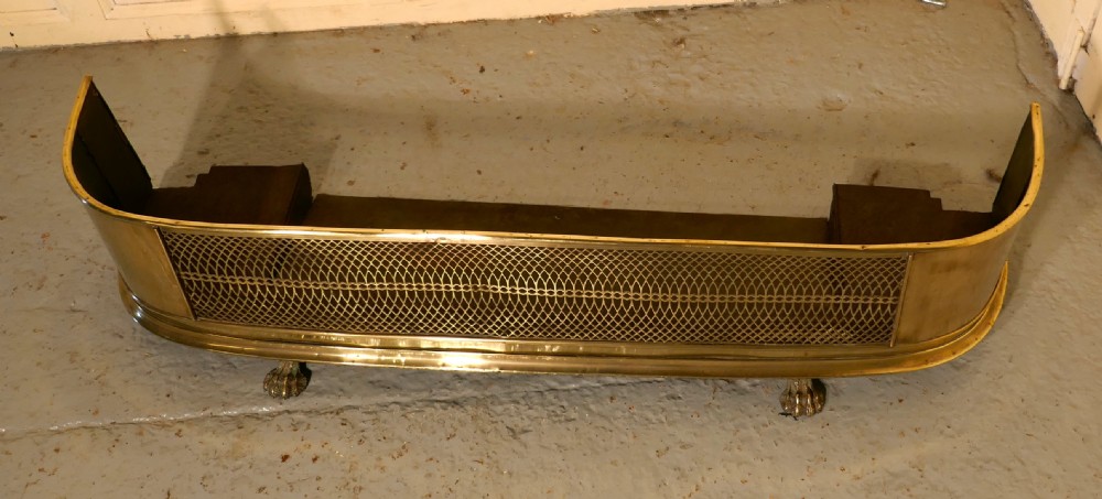 A Exceptional Georgian Pierced Brass Fender View II