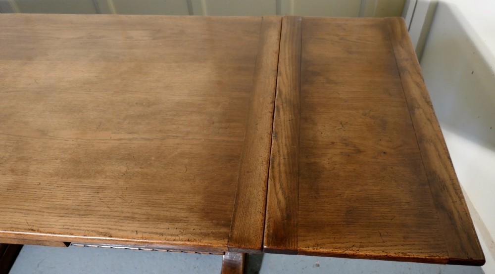 A Large Ipswich Oak Draw Leaf table View VII