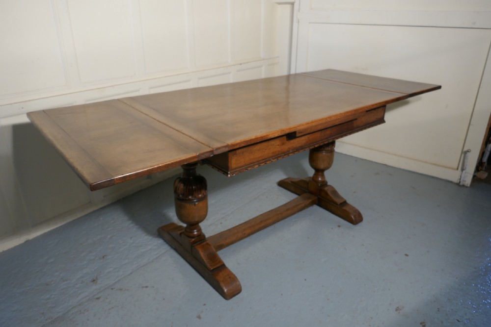 A Large Ipswich Oak Draw Leaf table View XII
