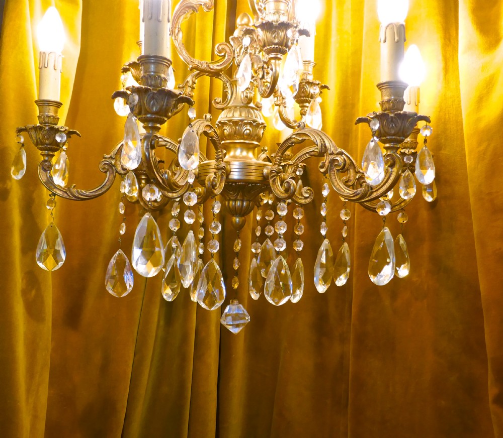 A Charming Large French Crystal and Brass 9 Branch Chandelier View VI
