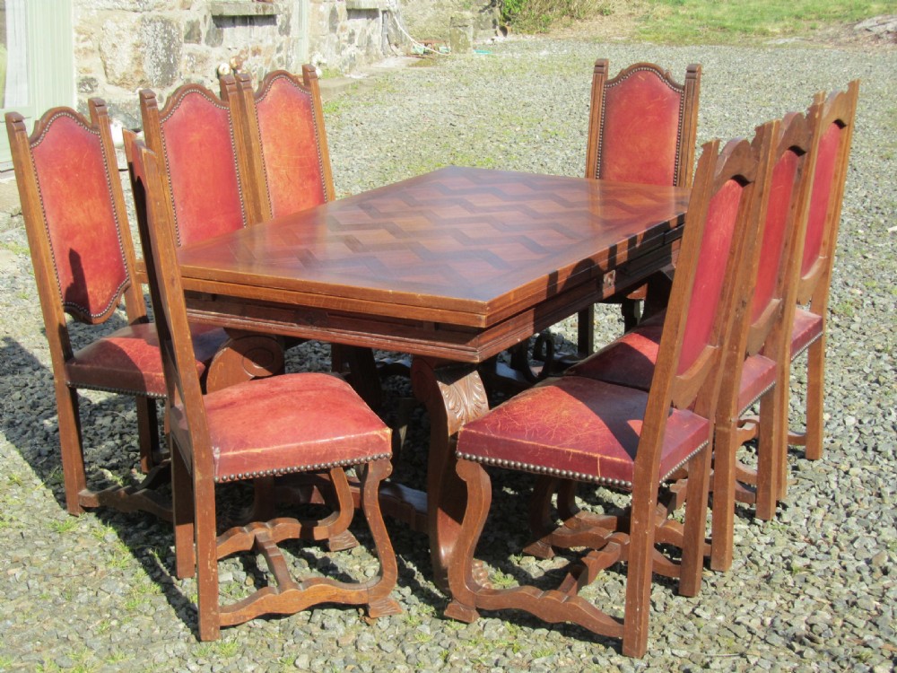 A Large 19th Century Carved and Parquetry Oak Draw Leaf table View III