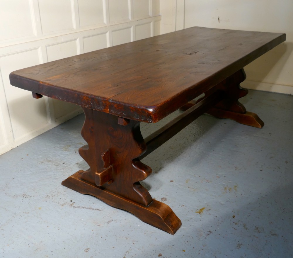 A Large French Elm Refectory Extending Table