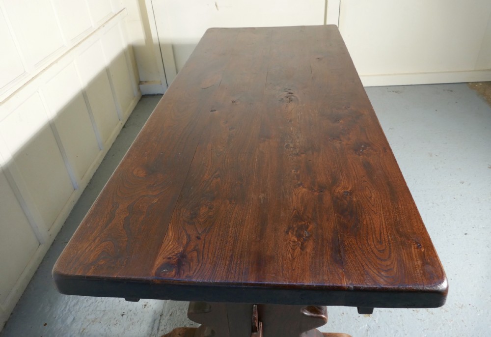 A Large French Elm Refectory Extending Table View IX