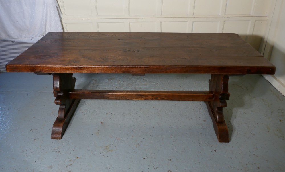 A Large French Elm Refectory Extending Table View XI