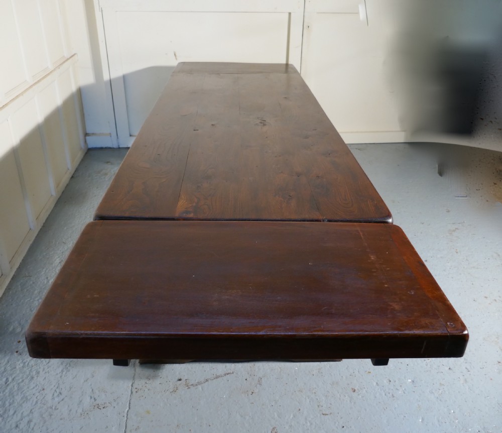 A Large French Elm Refectory Extending Table View XII
