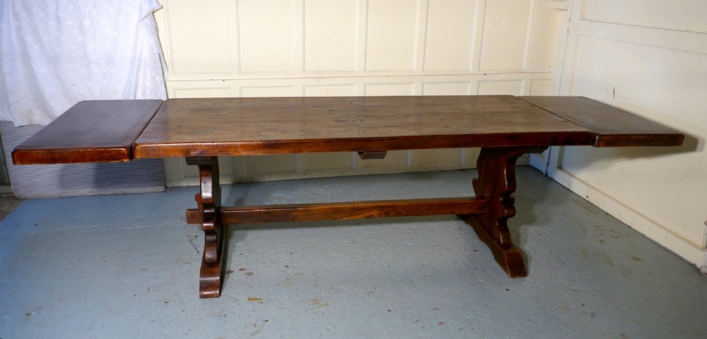 A Large French Elm Refectory Extending Table View XIII