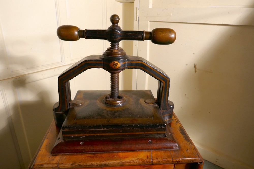 A 19th Century, Cast Iron Flower or Book Press, on Original Mahogany Table View II