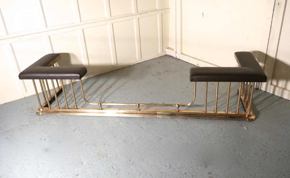 A Very Large Extending Brass and Leather Club Fender View II