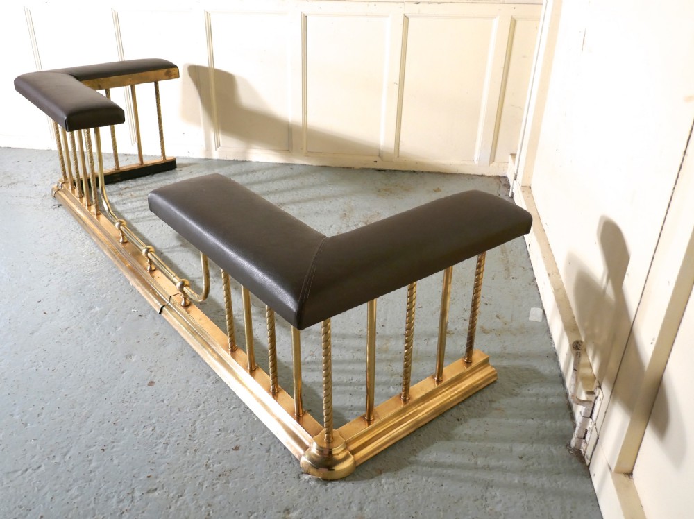 A Very Large Extending Brass and Leather Club Fender View IV