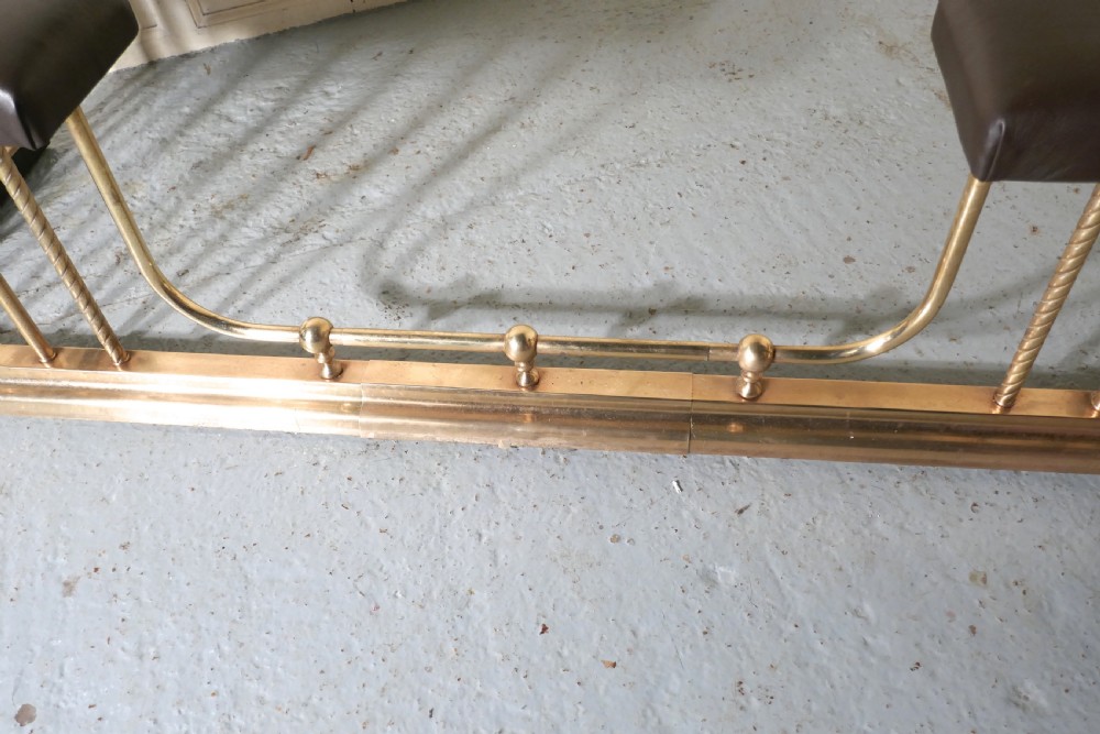 A Very Large Extending Brass and Leather Club Fender View VI