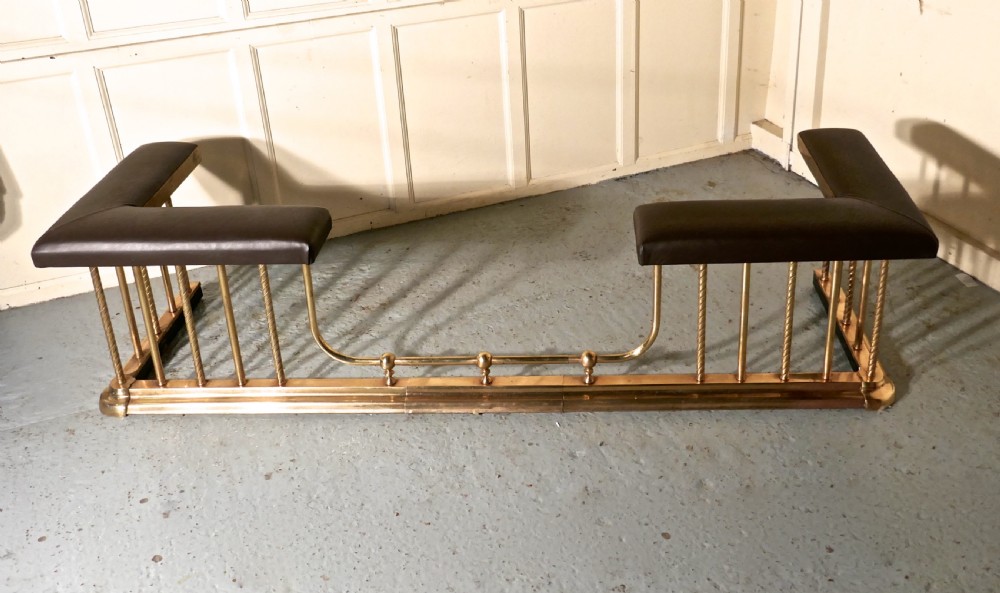 A Very Large Extending Brass and Leather Club Fender View VIII