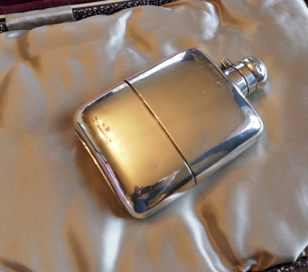 A Solid Silver Hall Marked Hip Flask and Cup by J Dixon, Sheffield 1909